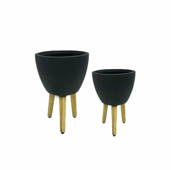 Black fiber planter with wooden legs